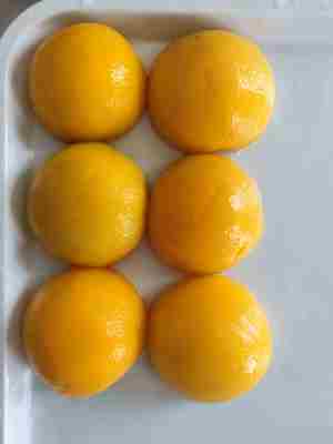 Χωρίς συντηρητικά Κονσερβοποιημένο κίτρινο ροδάκινο και νόστιμο